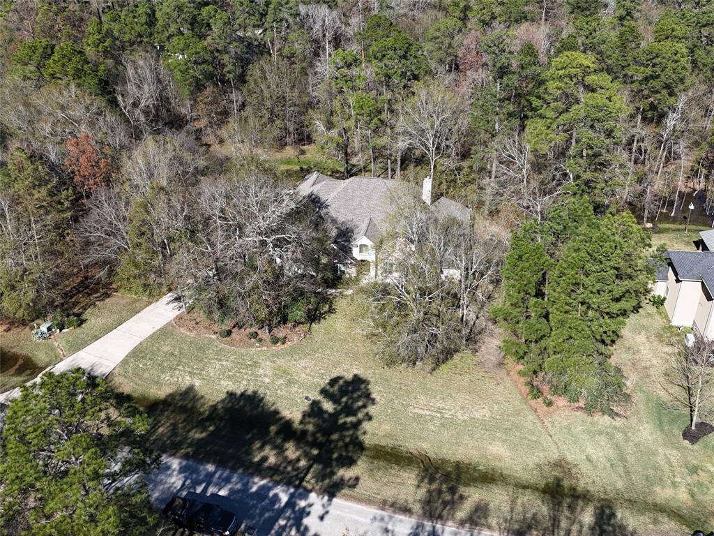 1 Acre lot, mature landscaping. Sprinkler system front and back.
