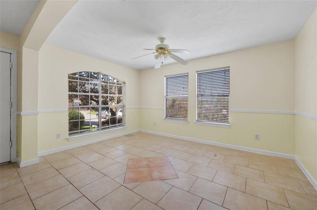 Living area with big windows for natural light.
