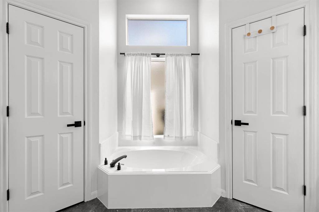 Nice soaking tub and two big closets!