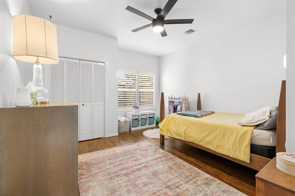 Another large secondary bedroom with nice wood laminate floors.