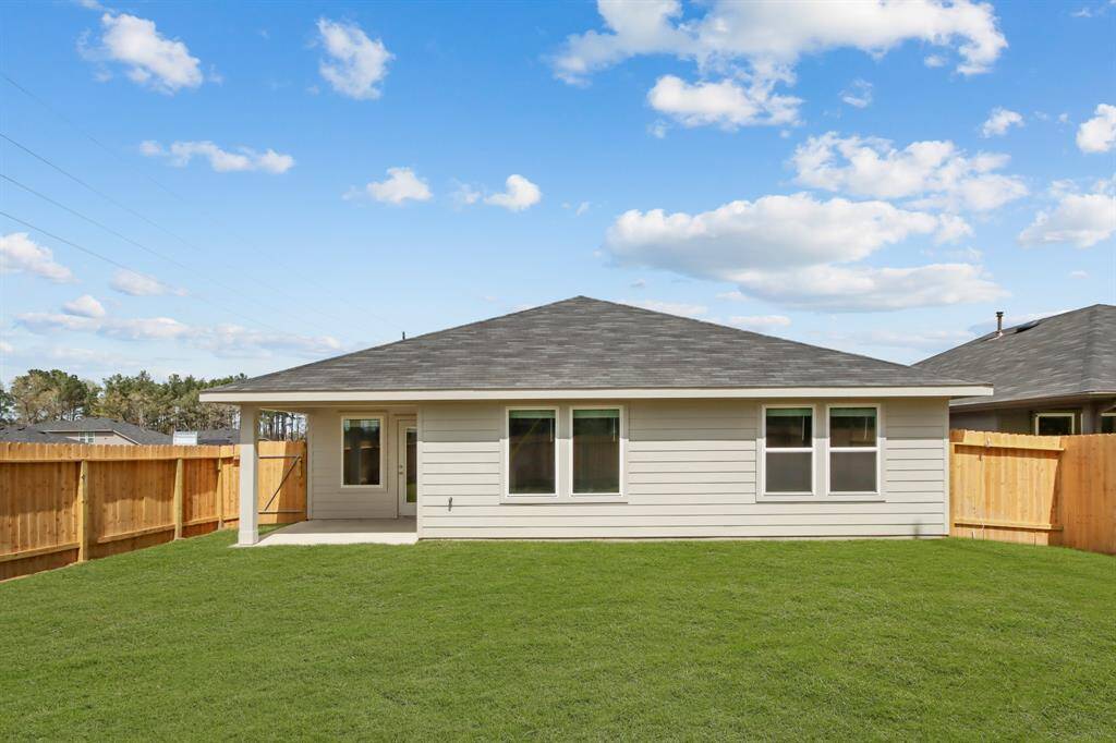 Spacious Back Yard with Sprinkler System!