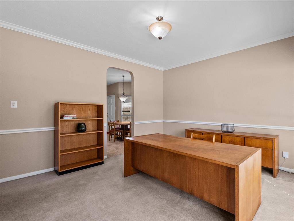 Formal diningroom current being used as an office.