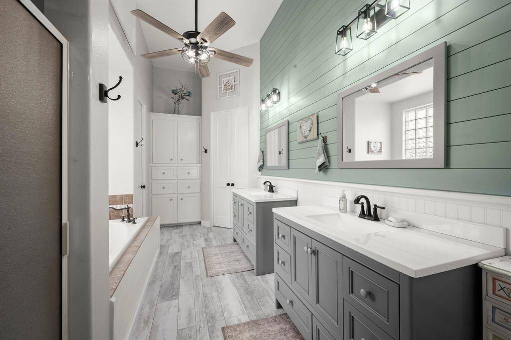 Beautiful primary bathroom with double vanities.