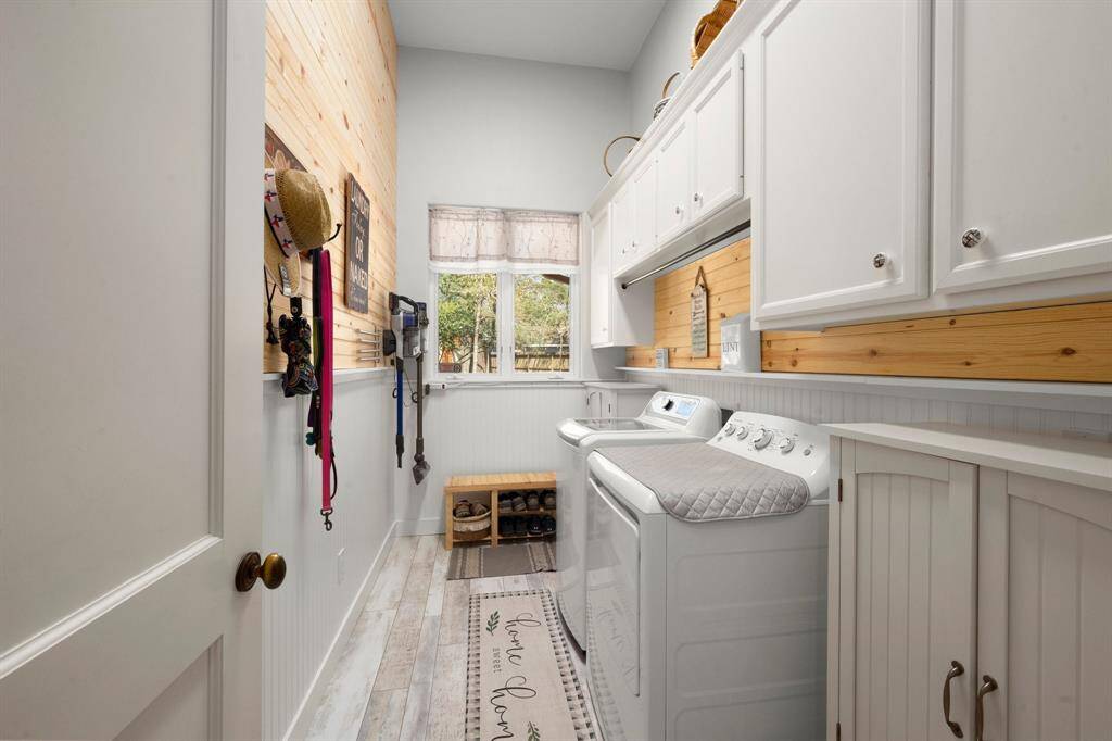 Utility room with much storage and space.