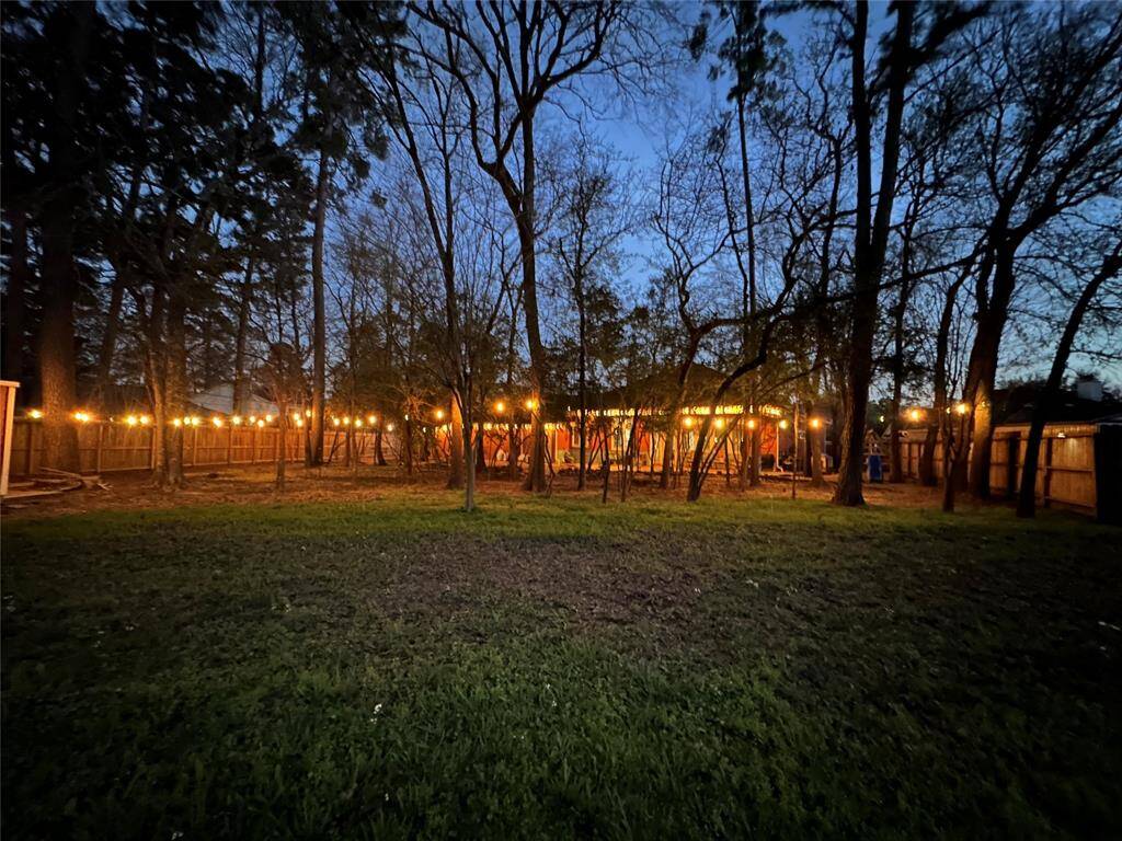Evening view of the lit back yard.