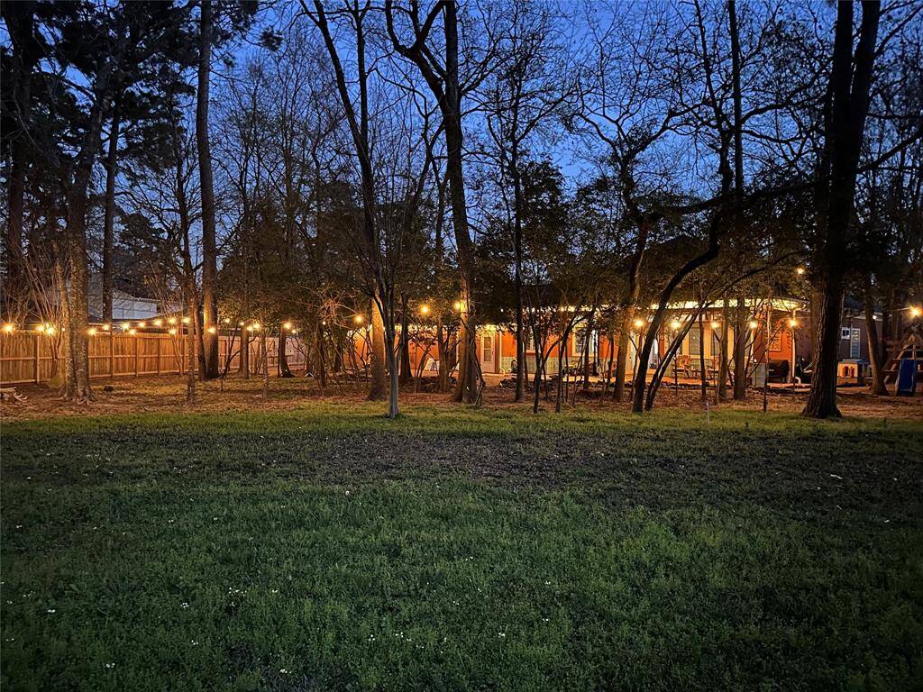 Evening view of the lit back yard.