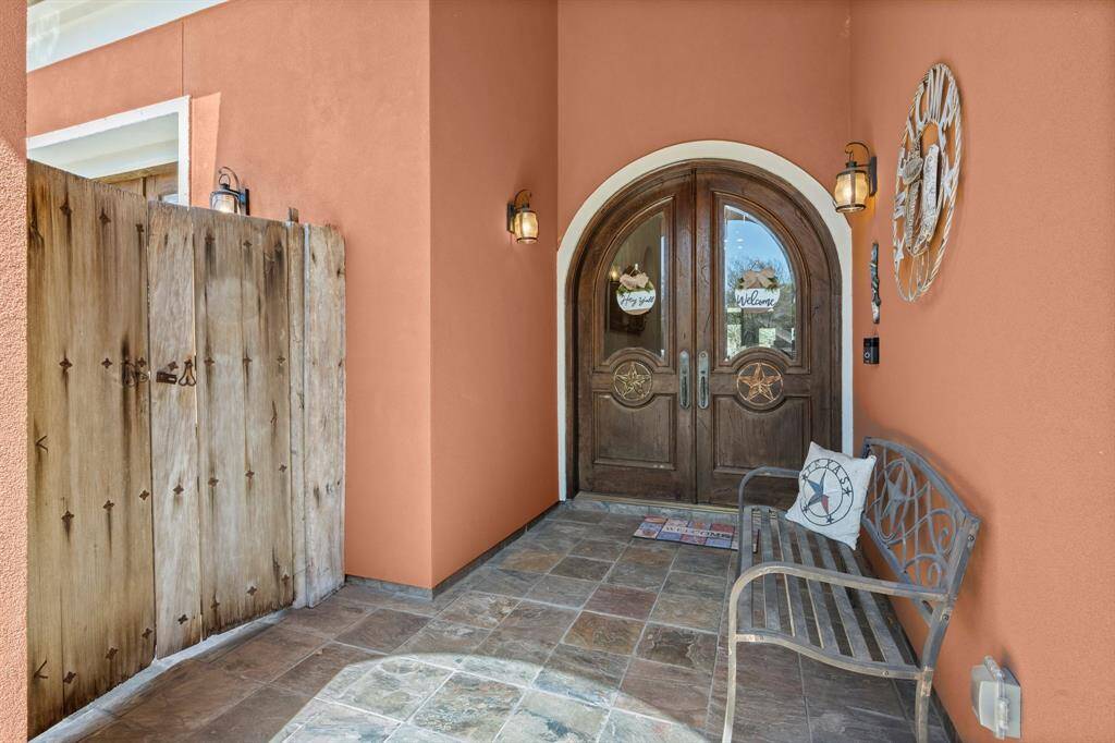 Large covered entry porch.