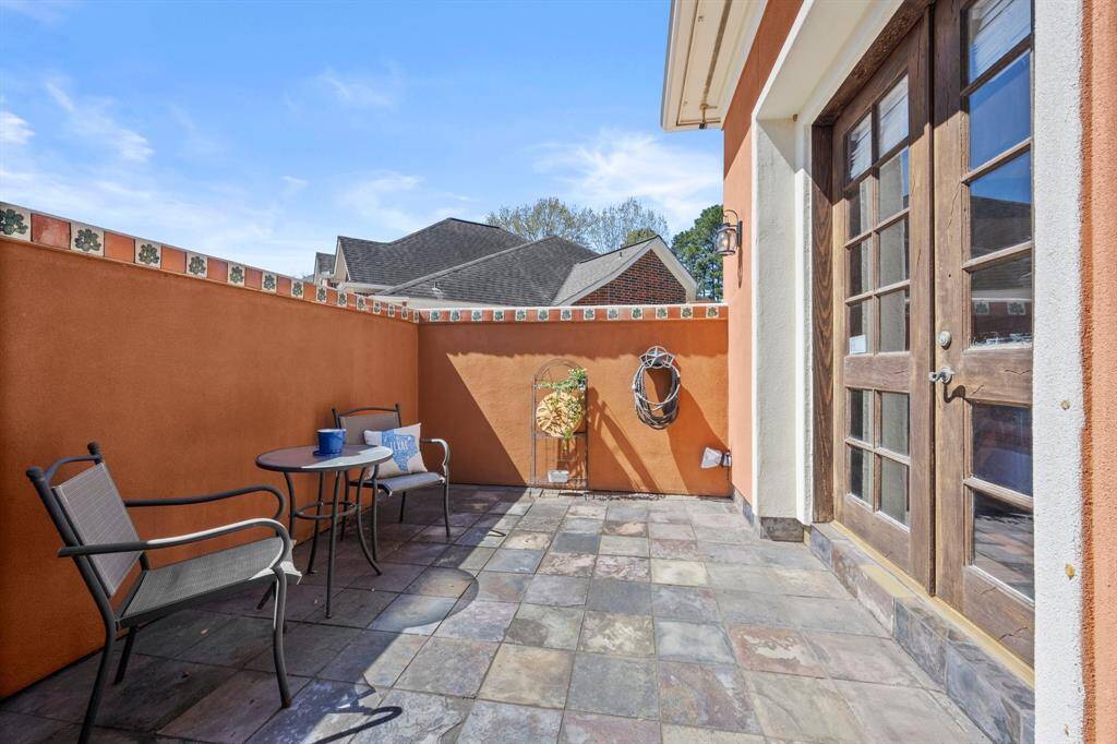 Private patio off the primary bedroom.