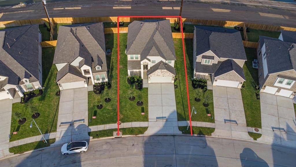 This home sits on a large lot with ample yard space in front and the back, lush landscaping and a well-maintained yard. This lot features NO REAR NEIGHBORS!