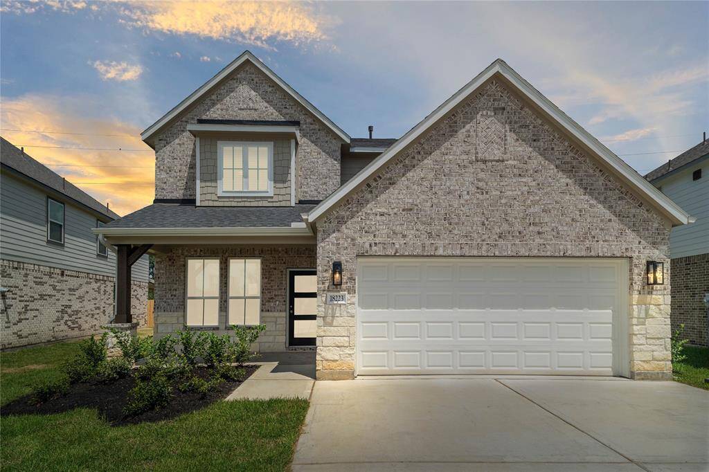 Welcome home to 18223 Windy Knoll Way located in Grand Oaks and zoned to Cypress-Fairbanks ISD.
