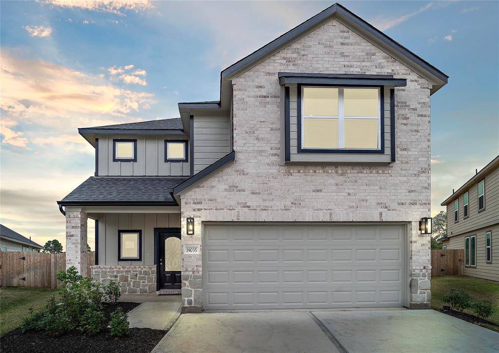 Welcome home to 19035 Rising Mesquite Street located in the community of Grand Oaks Village and zoned to Katy ISD.