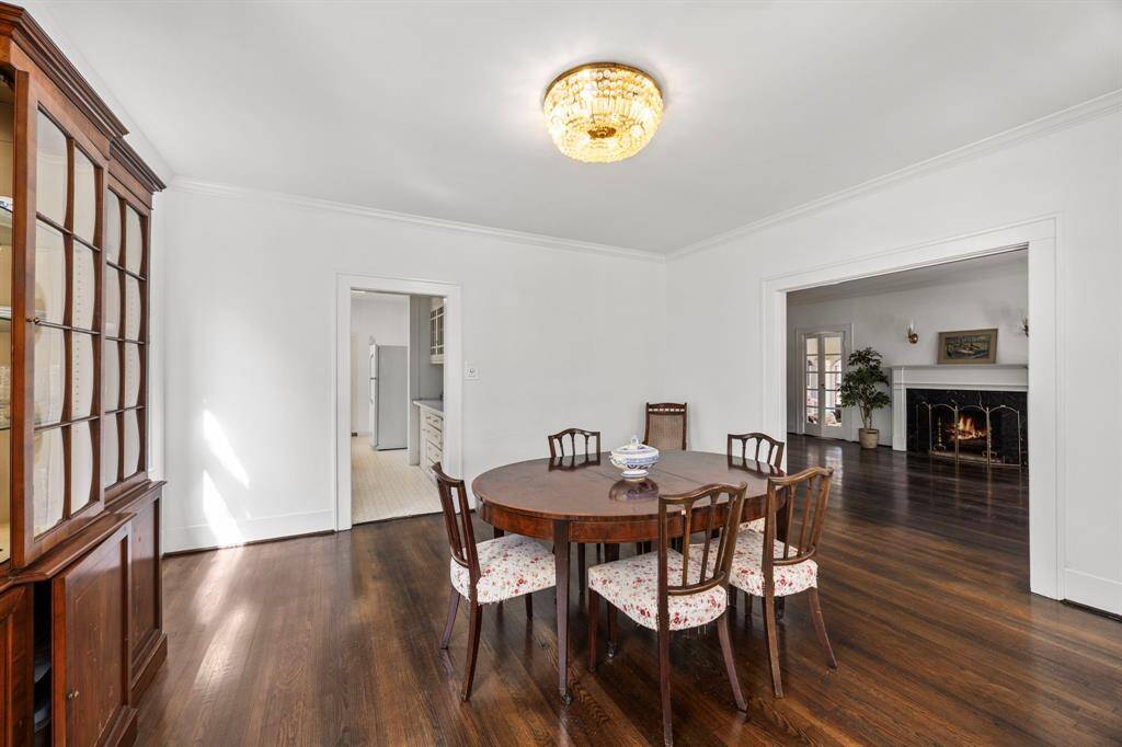 Elegant dining room with potential for kitchen expansion by removing the adjoining wall and fully open to the living room.