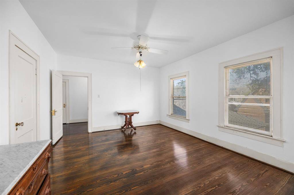 Third spacious upstairs bedroom with abundant natural light. All upstairs bedrooms are generously sized.