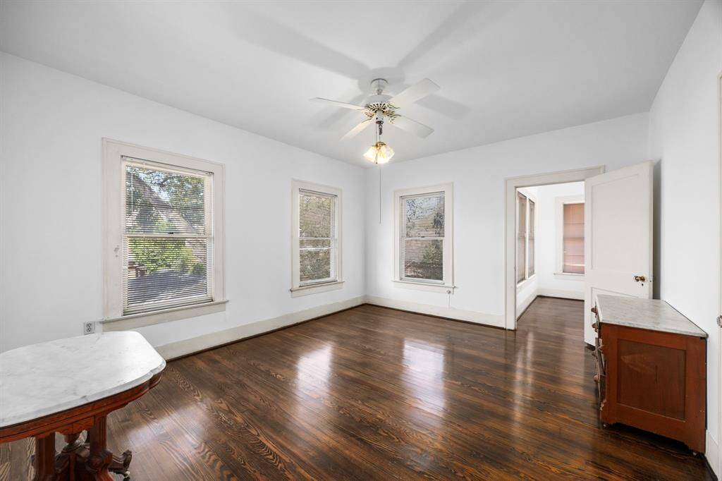 Another view of the bright and spacious upstairs bedroom with abundant natural light. All upstairs bedrooms are generously sized.