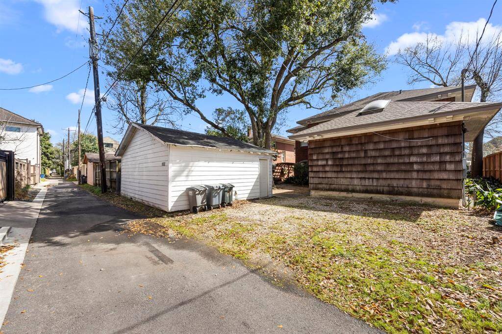 Nicely paved alley. The alley access offers convenience for parking and additional configurations.