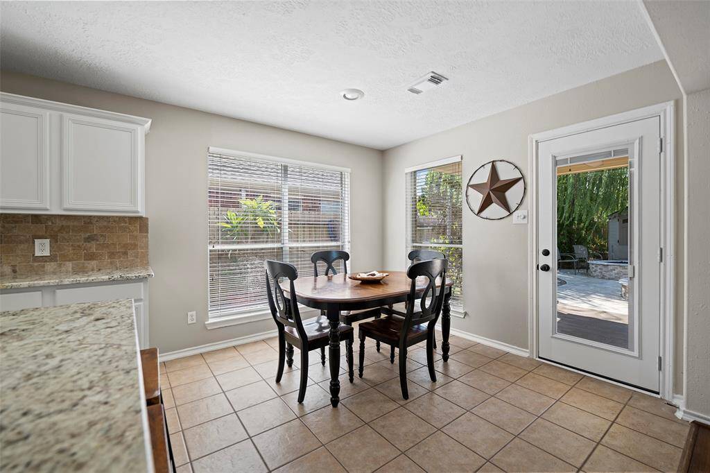 A cheery breakfast room with loads of natural light is the perfect spot to sit and enjoy your morning coffee!