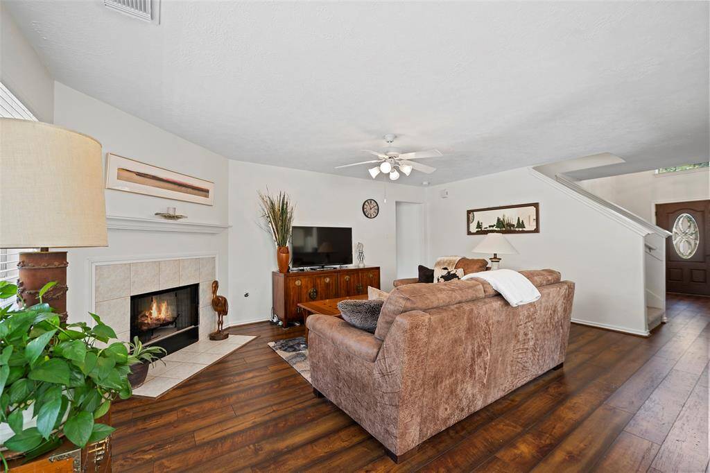A corner fireplace will surely warm the hearts of all that gather here!
