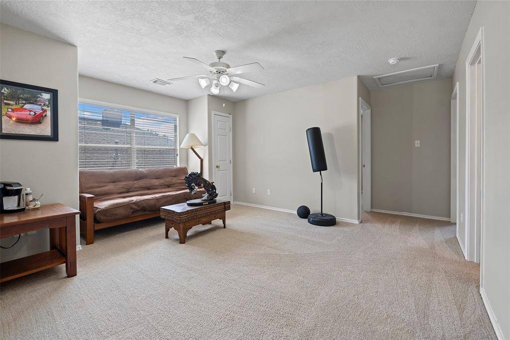 Here is the upstairs hang out spot! This game room is light and bright and ready for play action!