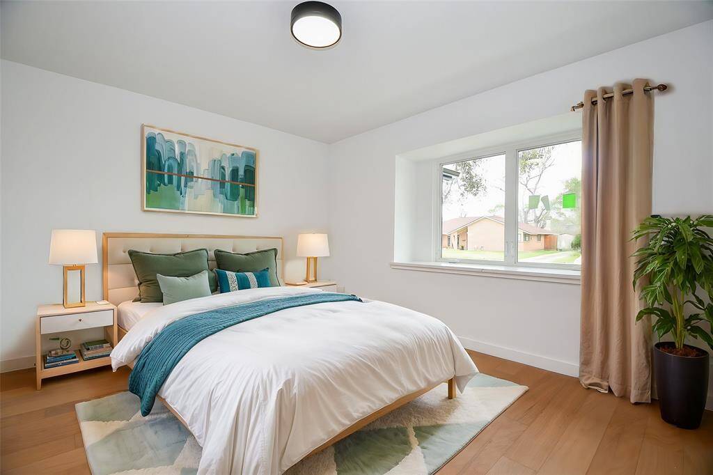 This comfortable room has a window ledge. with crank out windows.