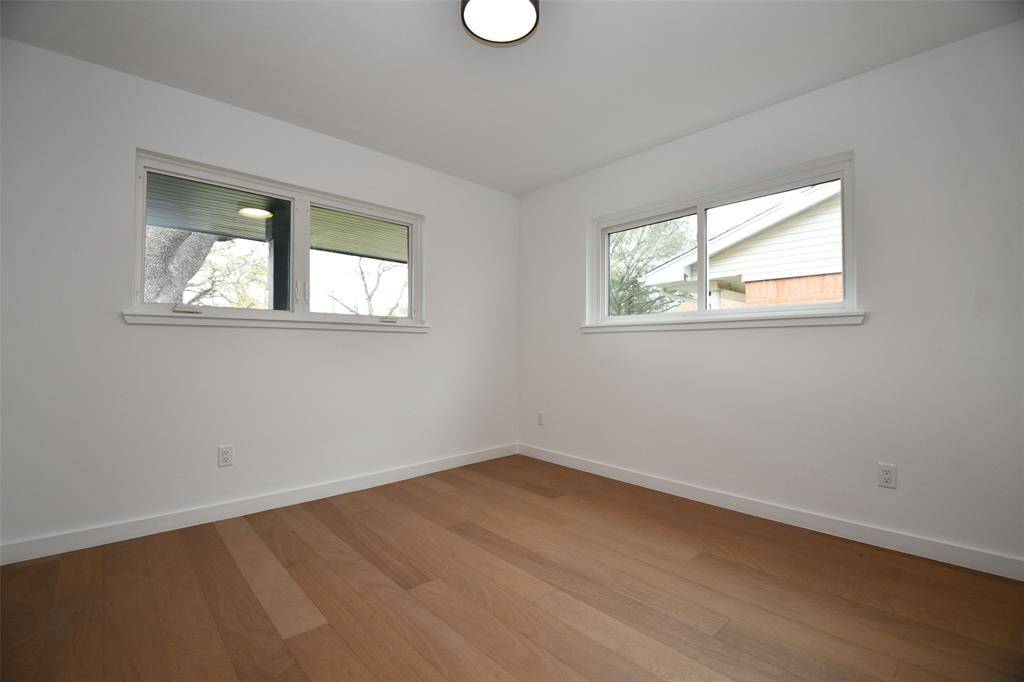 The first of the secondary bedrooms located at the front of the home is nice and bright