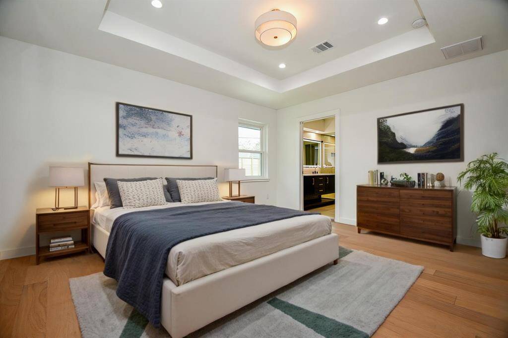Primary bedroom with ensuite is the ultimate getaway.