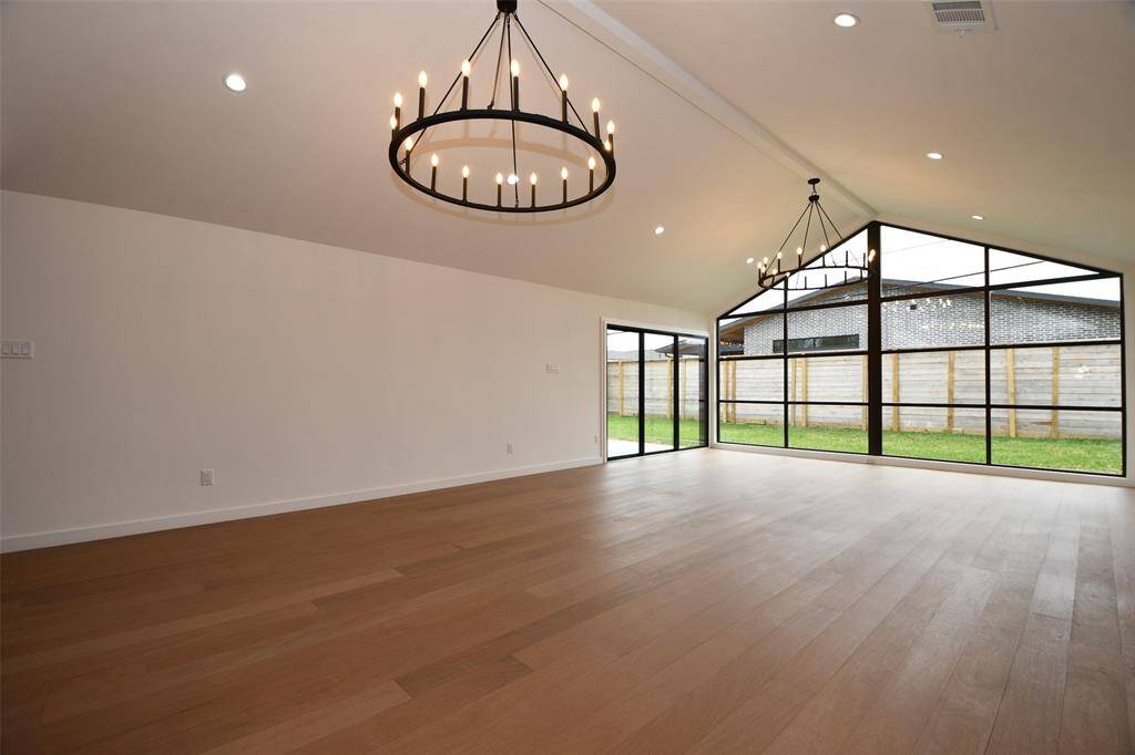 The flooring is Brazillian Oak and will blend with any decor.