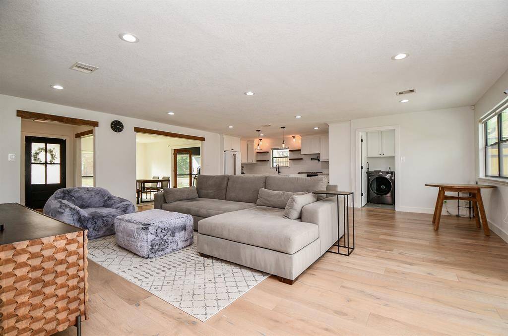 Spacious living room with an inviting open floor plan, perfect for modern living.