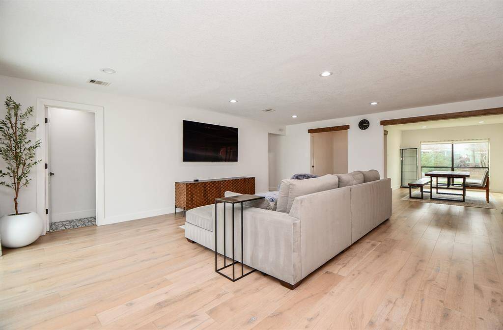 Spacious living area with modern finishes, abundant natural light, and seamless flow to the dining space. Perfect for entertaining or relaxing.