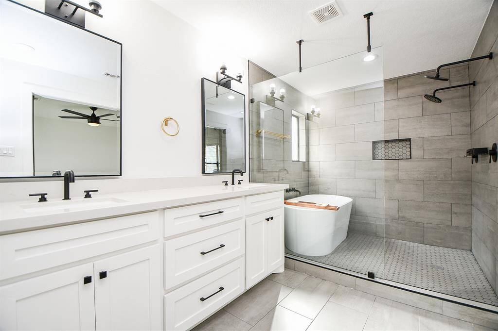 Elegant dual sinks enhance convenience and style.