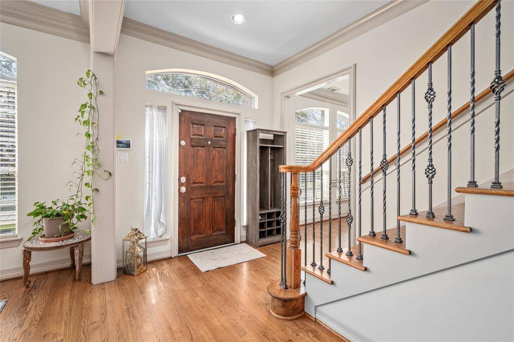Heart-warming and home-inviting! These gleaming hardwoods and traditional stairs showcase a comfortable life on Durness Way.