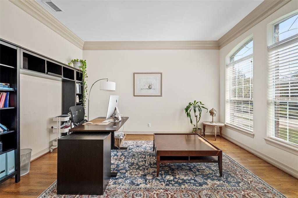 This formal space is currently being used as an office.