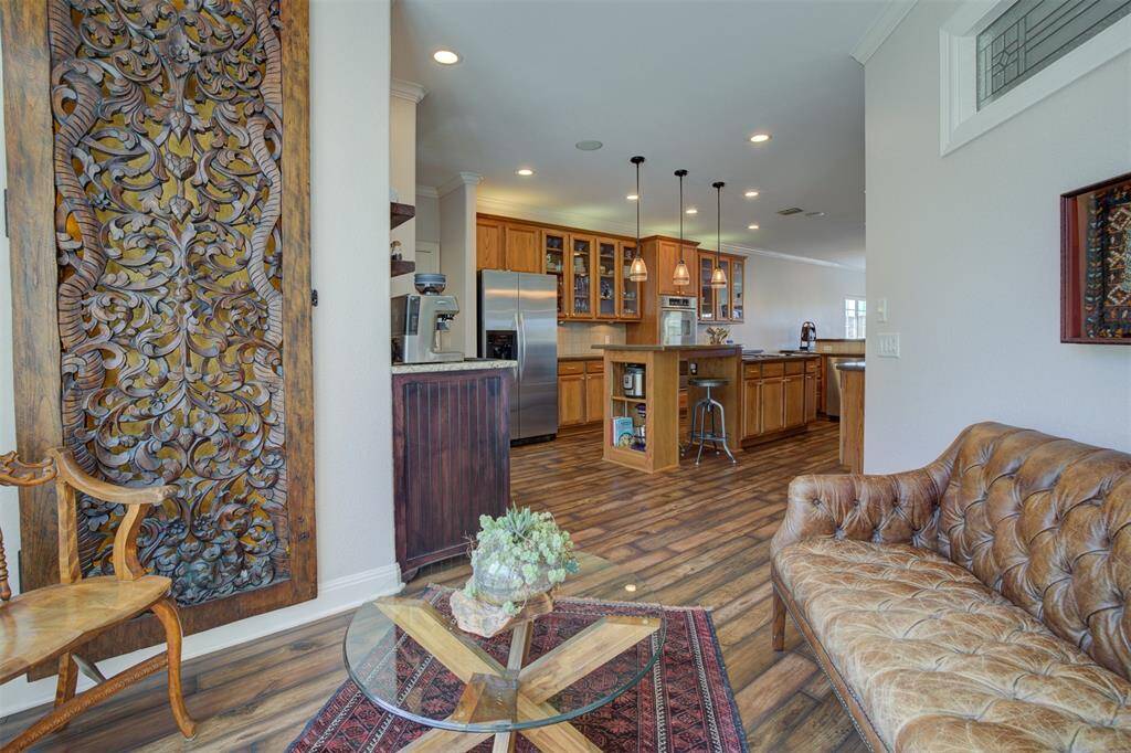Cozy conversation area is located off the kitchen.