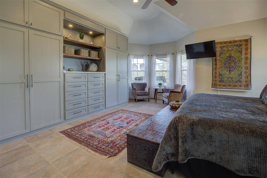 Built-in wardrobes and drawers used to create added extra storage space.