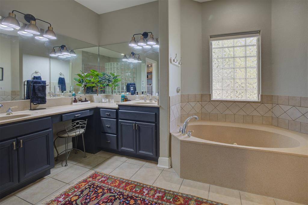 Primary bathroom with double vanity.
