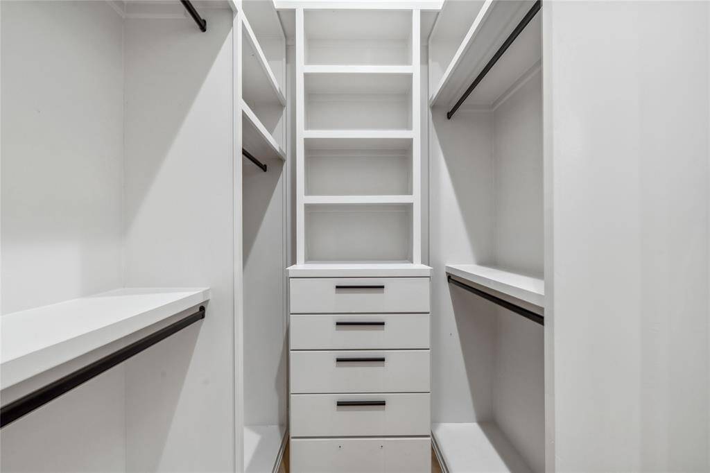 Built-in drawers and shelving create the perfect opportunity for a beautifully organized closet.