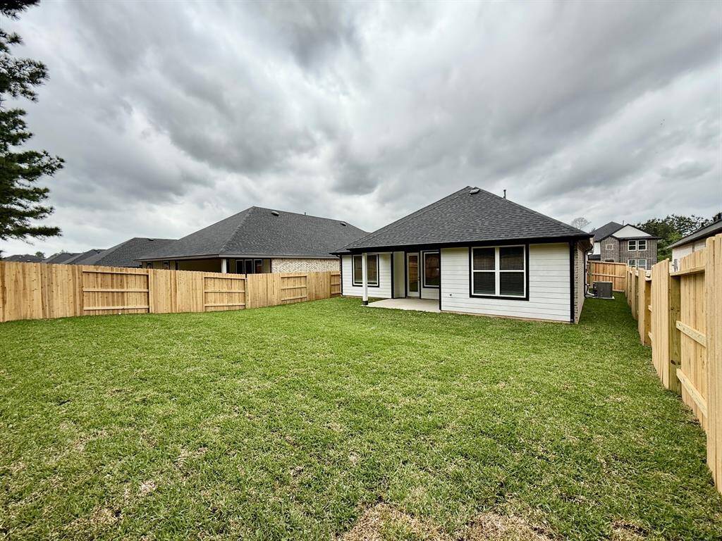 Useful Covered Patio and Sprinkler System!
