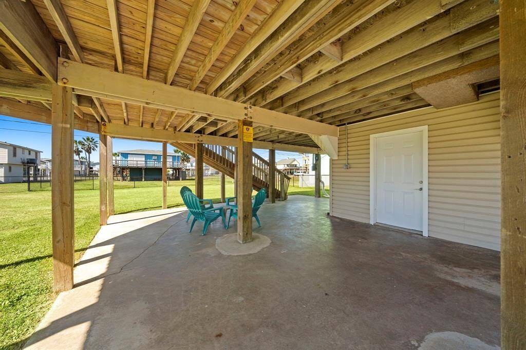 The spacious upper deck provides ample space for outdoor lounging, dining, or simply soaking up the sun.