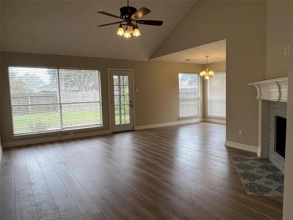 Large family room with wood burning fireplace