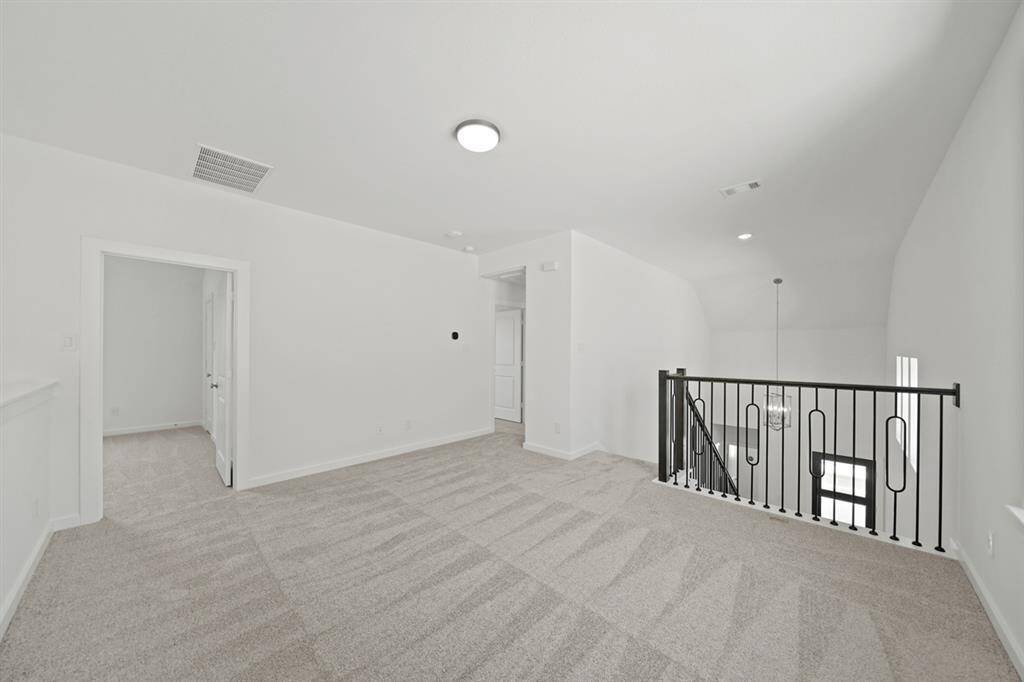 A large game room provides an inviting atmosphere with plenty of space and natural sunlight