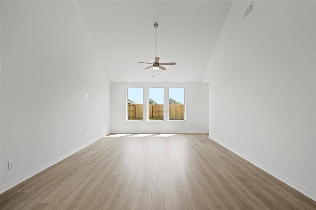 You are greeted by the amazing flow of this home, starting from the grand entryway, into the kitchen, and leading up to the family room