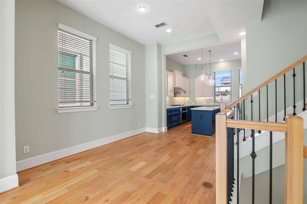 This shot features the dining area between the family room and kitchen.