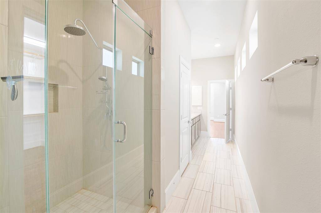 Opposite view of the primary bathroom.