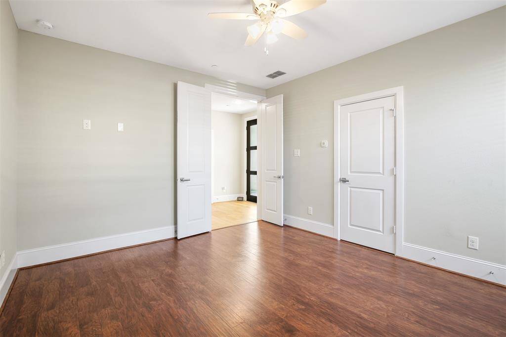 The is a secondary bedroom located on the first floor. It has an en suite bathroom to the right.