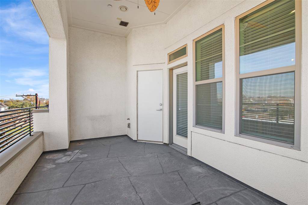 Spacious patio with a tiled floor, gas hook up for a grill, and the closet also has extra storage space.