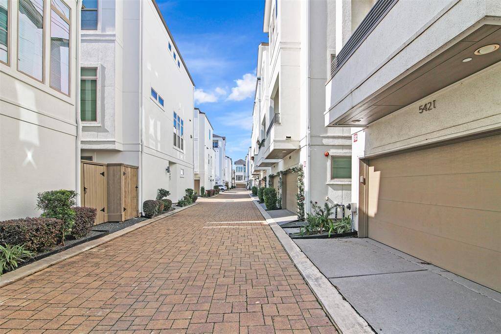 View of the beautiful paved, shared driveway and gorgeous community.