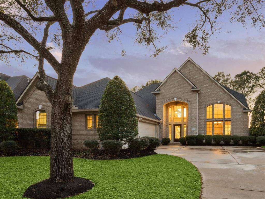 Rarely available lakefront home in a prime cul-de-sac location in the gated community of Lakes on Eldridge North.