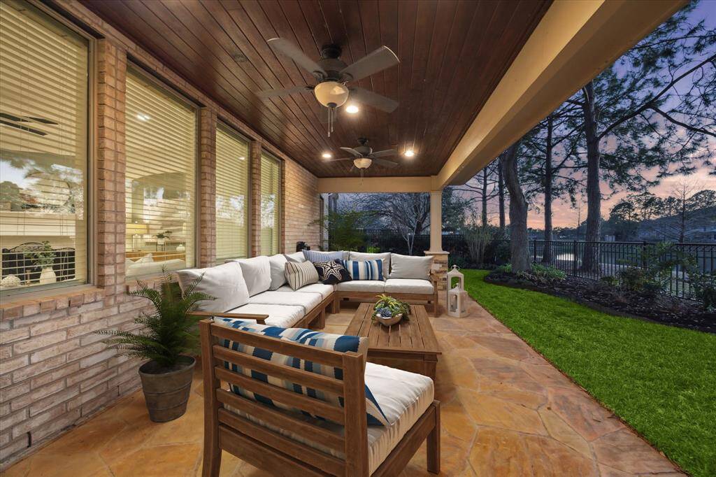 This serene outdoor space offers the perfect setting for both relaxing and entertaining, with the tranquil water serving as a stunning backdrop. Whether enjoying a quiet morning coffee or hosting an evening gathering, the patio’s scenery creates an inviting retreat. *This photo has been virtually staged.