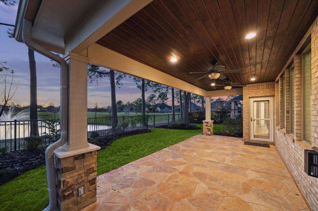 The patio is perfect for dining alfresco. The door leads to the breakfast room.