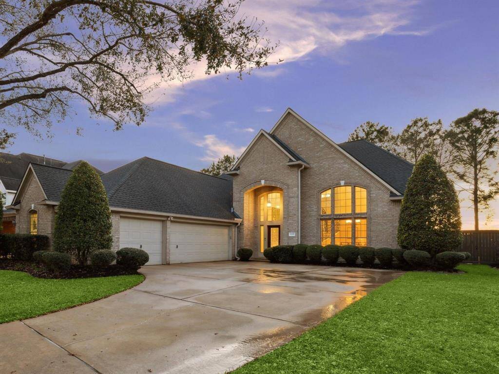 Spacious 3-car garage equipped with a 240V EV charging port.