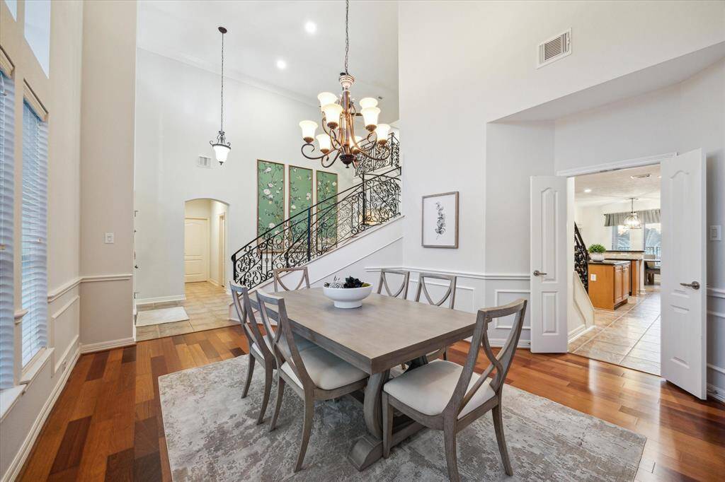 The formal dining area ensures effortless flow for entertaining. Whether hosting a dinner party or enjoying a quiet meal, this stylish space combines both functionality and charm.